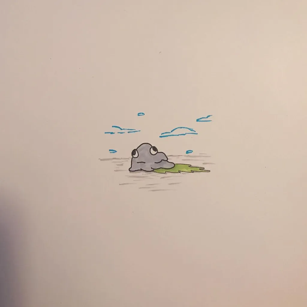 A gray, rounded creature rests on a green base, surrounded by several small blue lines that suggest water ripples on the white paper.