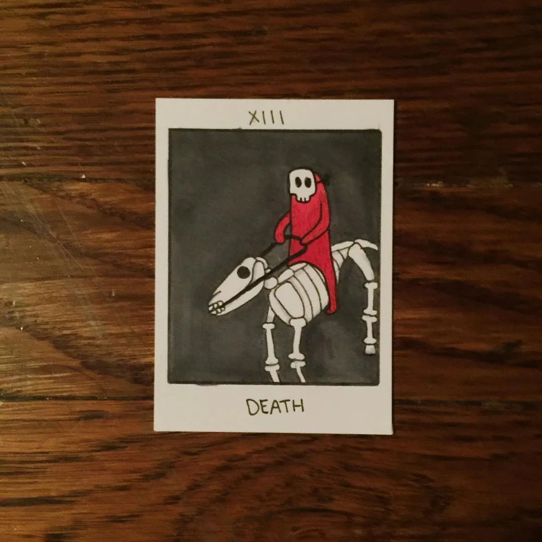 A stylized drawing of a skeleton figure wearing a red hooded robe stands against a dark gray background on a white card, labeled XIIII and DEATH.