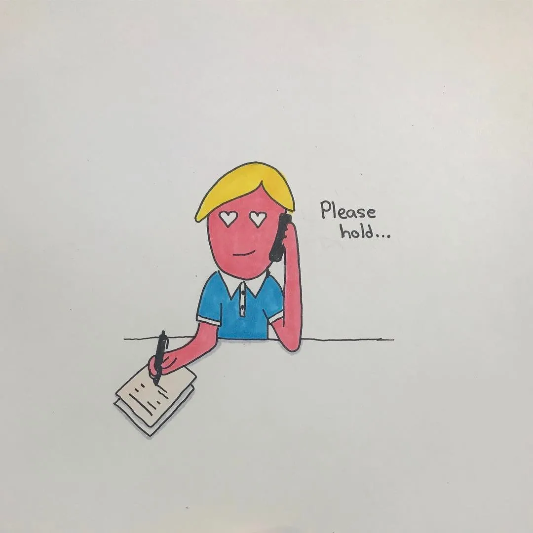 A cartoon drawing shows a blonde figure in a blue shirt writing on paper while holding a phone, with heart shapes drawn on the cheeks, and the text Please hold... visible.