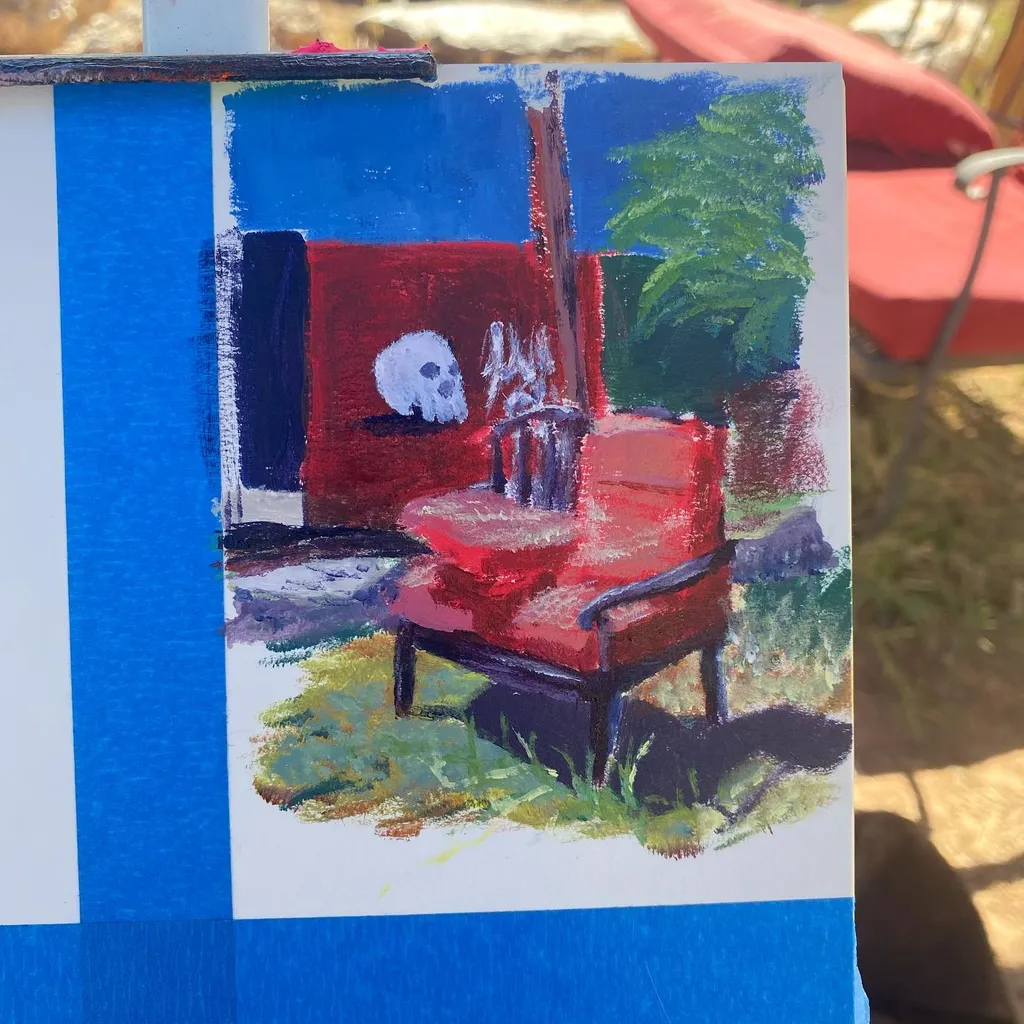 A painting featuring a bright red chair and a red background element, with a white skull visible on the wall, set against green foliage and framed by blue vertical and horizontal bands.