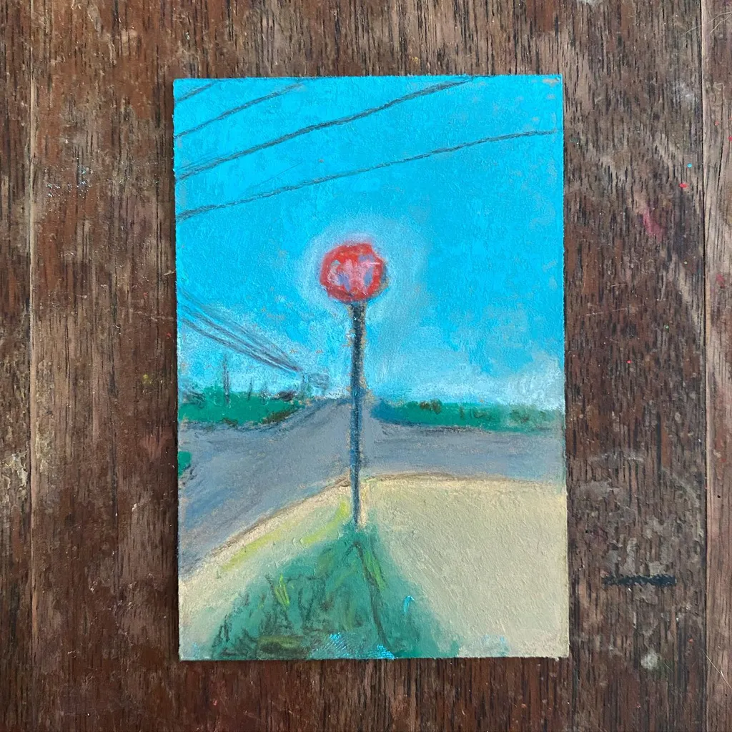 A vertical painting depicts a roadside scene under a bright cyan sky, centered by a large red sphere on a pole, with a muted landscape and tan foreground, all mounted on rough brown wood.