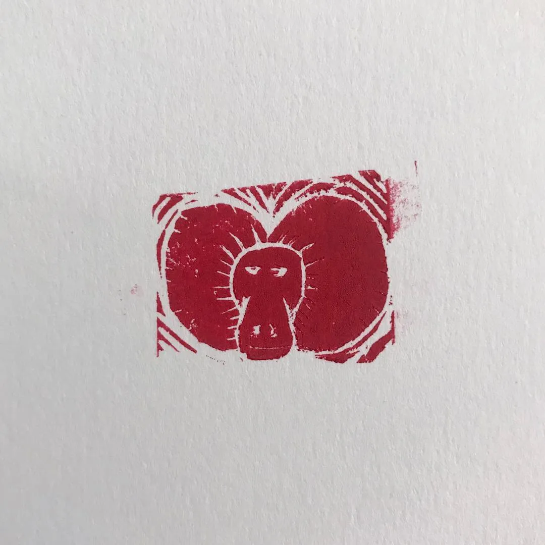 A stylized face composed of three overlapping, textured red shapes is centered on a white background, featuring rough, visible edges.
