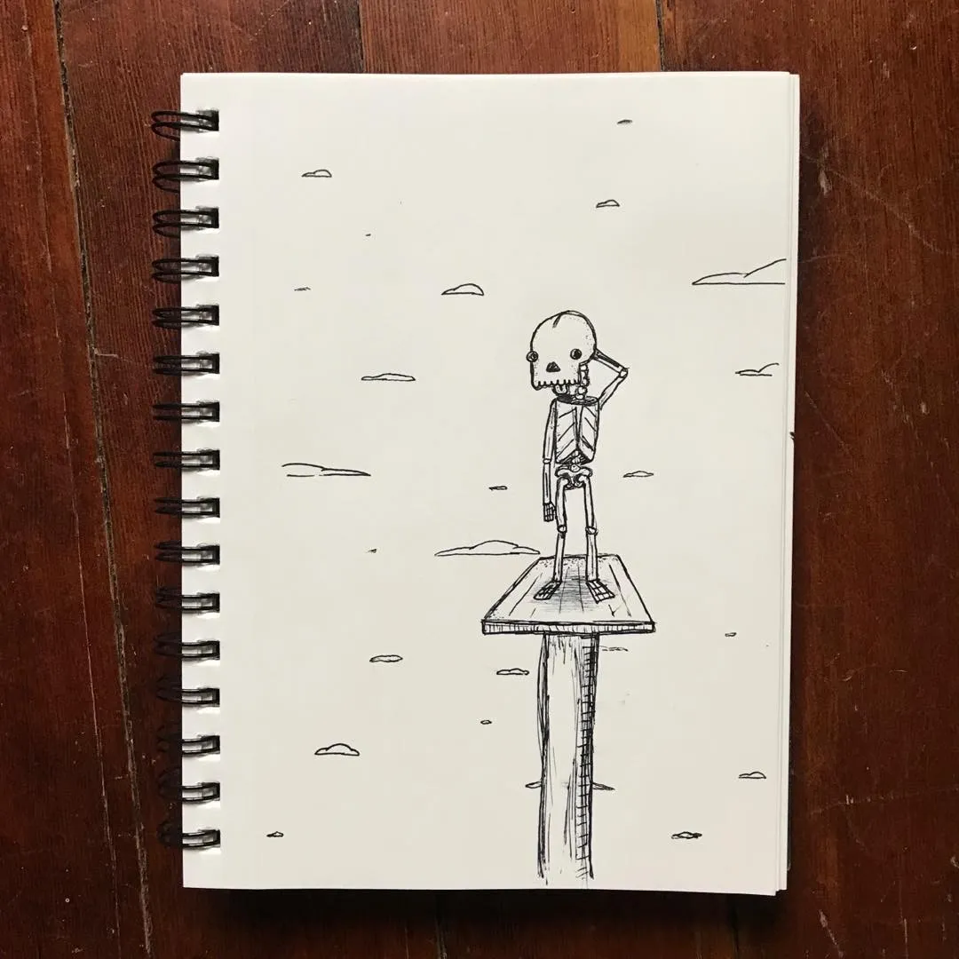 A black ink drawing on white paper depicts a stylized skeleton standing on a small platform, posed with one arm raised, against a background of simple sketched cloud shapes.