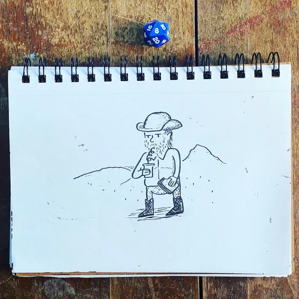 A black and white line drawing of a bearded man in a hat stands on a notepad, which is placed on dark wood next to a blue, white, and red polyhedral die.