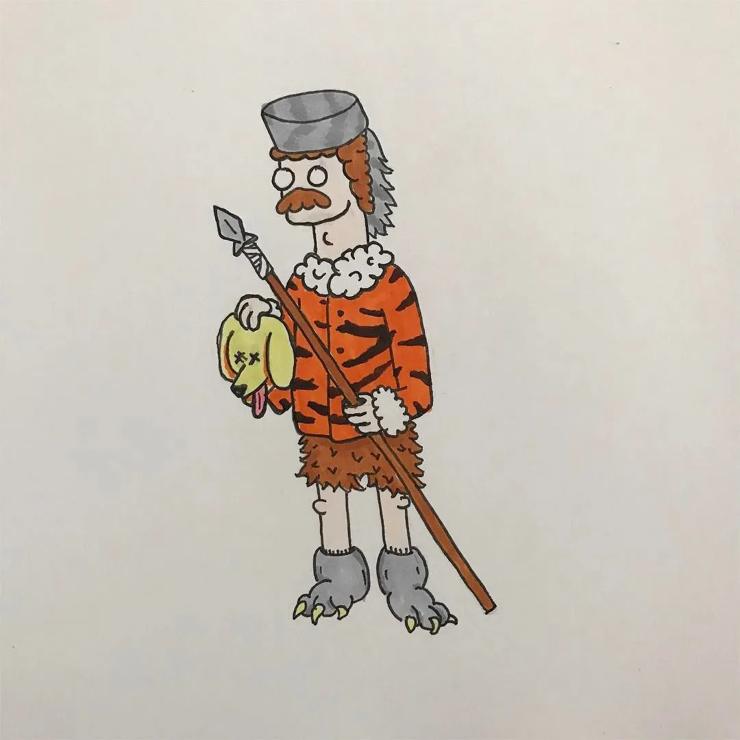 A cartoon figure with a mustache, wearing a grey cap and orange and black striped clothing, stands holding a spear and a yellow object, with a brown furry skirt.