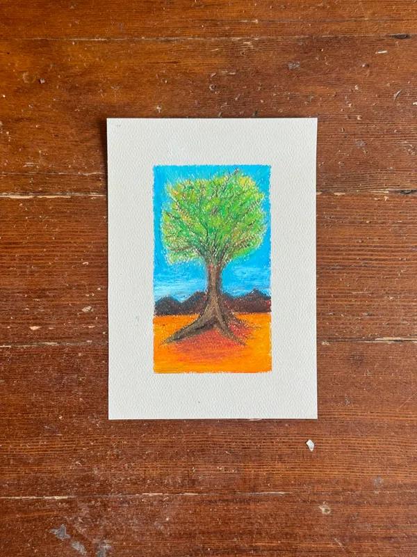 The composition features a bright green tree centered against a light blue sky and an orange ground, set above a dark silhouette of hills.
