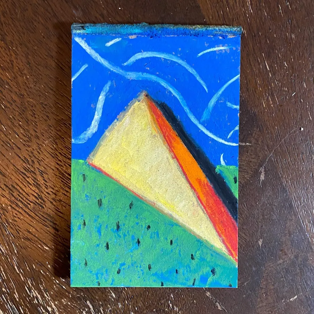 A stylized landscape features a blue sky with white wavy lines above a green foreground, dominated by a large yellow and orange triangle resting on the ground.