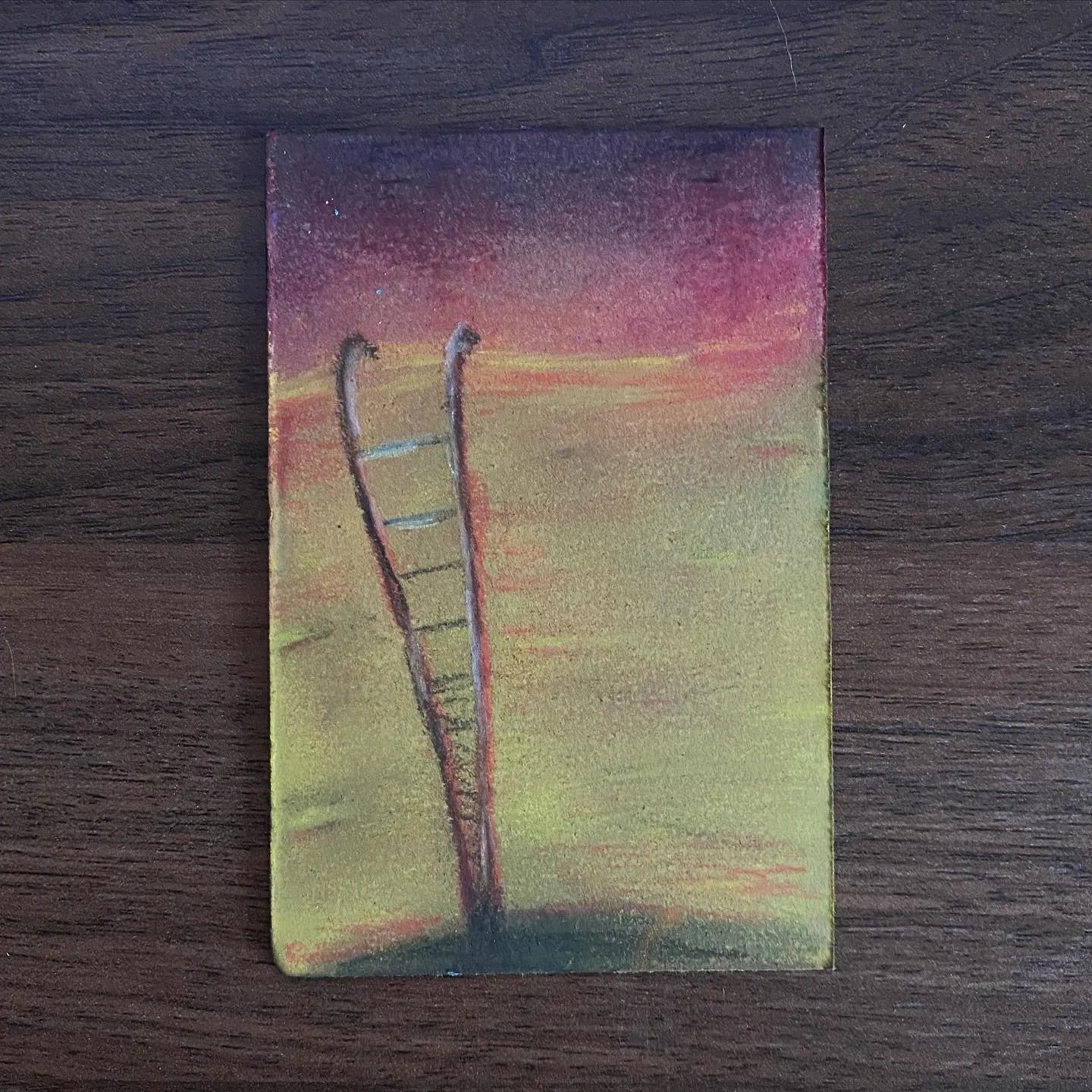 A vertical composition features a ladder on the left, set against a gradient background that shifts from deep purple and magenta at the top to soft yellow and green near the horizon.