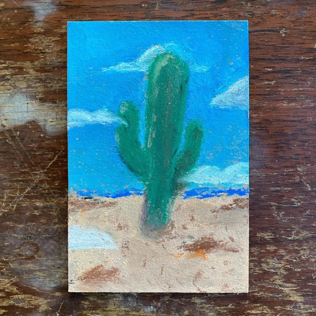 A central green saguaro cactus stands in a tan desert foreground beneath a bright blue sky dotted with white clouds.