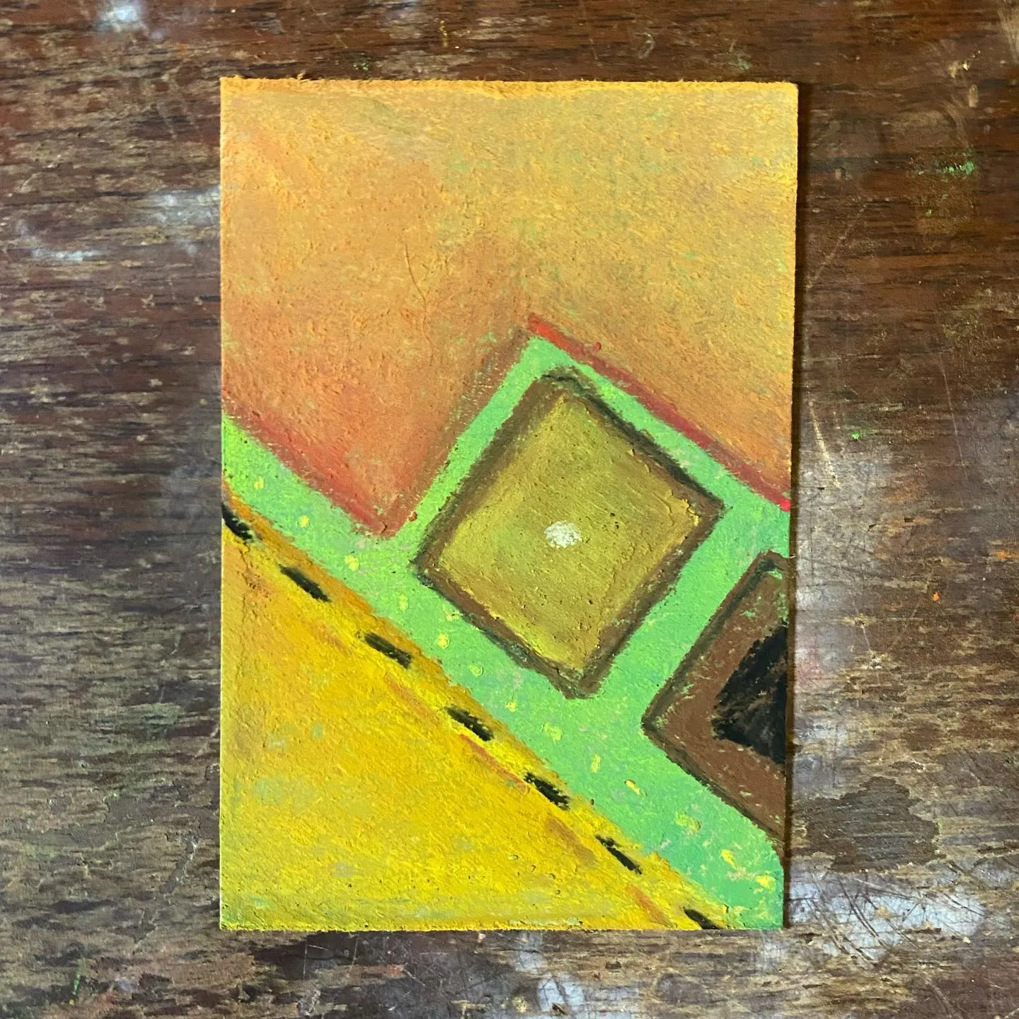 Geometric abstract composition featuring a top ochre gradient meeting a bottom section of bright yellow and layered green and olive squares, marked by diagonal lines.