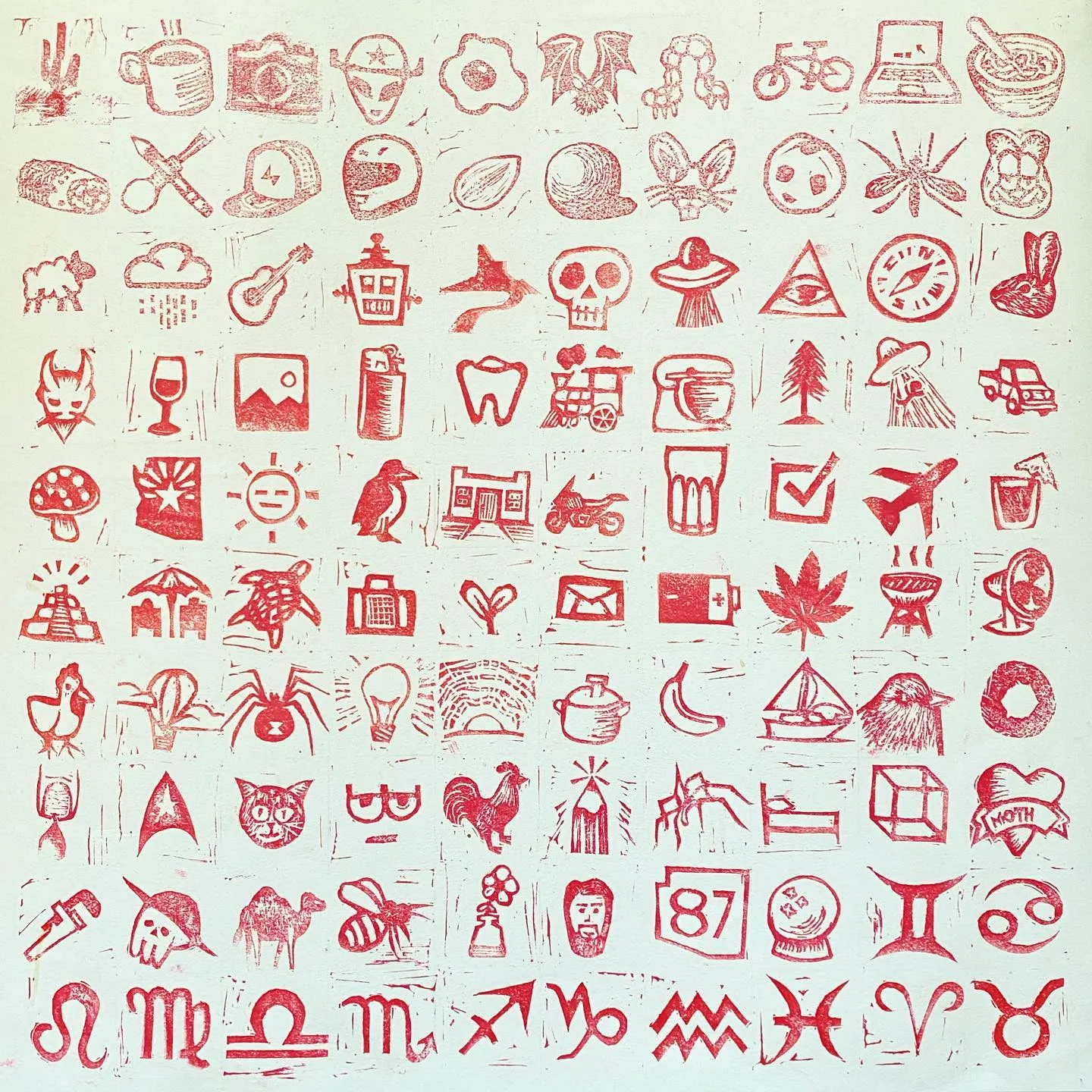 A dense grid of red, hand-drawn doodle icons, including zodiac signs, animals, and everyday objects, arranged in rows across the light background.