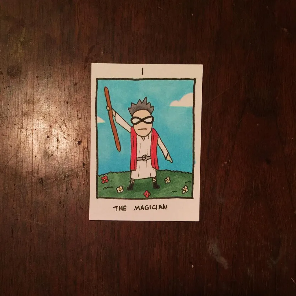 The drawing depicts a cartoon magician with spiky hair and glasses, dressed in a red and white outfit, standing in a grassy outdoor scene beneath a blue sky, with the words THE MAGICIAN printed below.