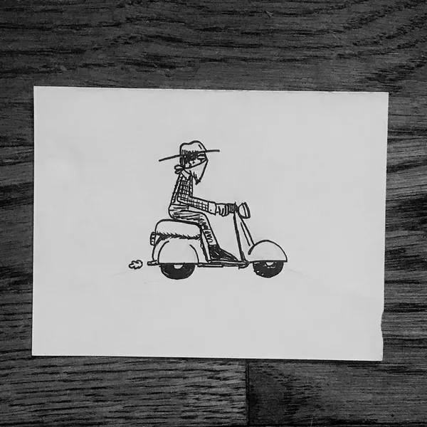 A stylized line drawing depicts a figure wearing a hat riding a small scooter, positioned on white paper against a dark, textured wooden background.