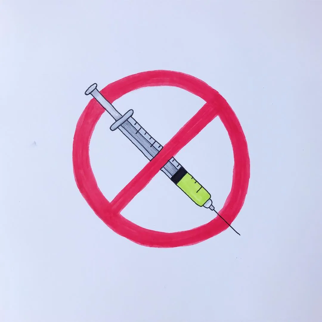 A red circle with a diagonal line crosses over a drawing of a syringe, which is composed of silver, black, and bright green sections.