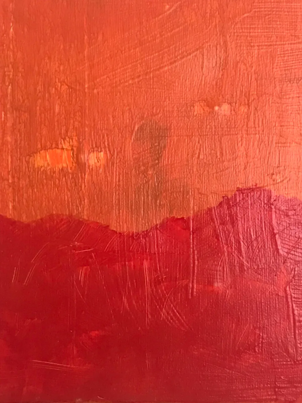 Abstract composition of warm colors, featuring a deep red base and an ochre upper field, separated by a dark, undulating horizon line with visible, layered brushstrokes.