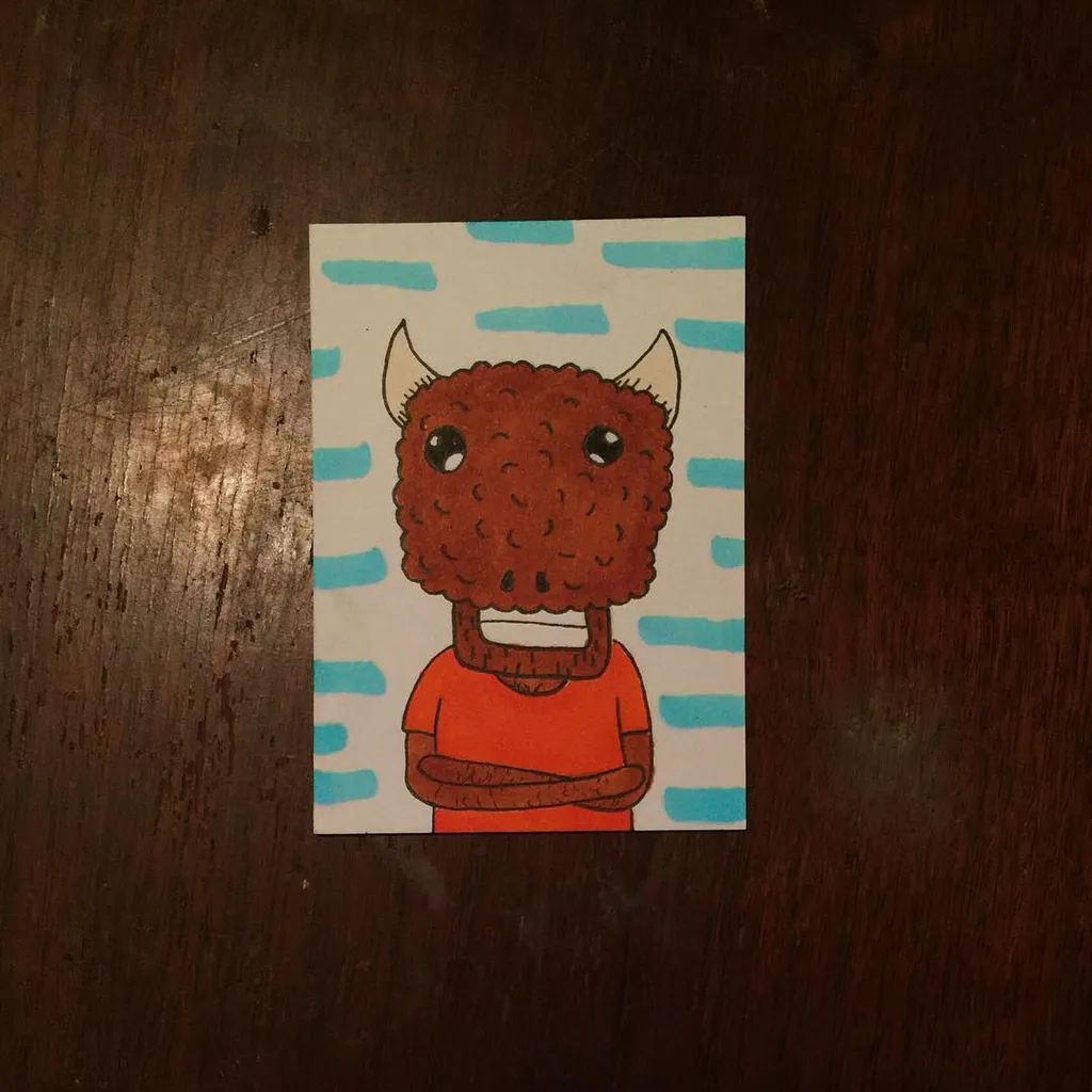 A cartoon character with a reddish-brown, textured head and small horns wears an orange shirt against a background of light blue and white horizontal stripes.