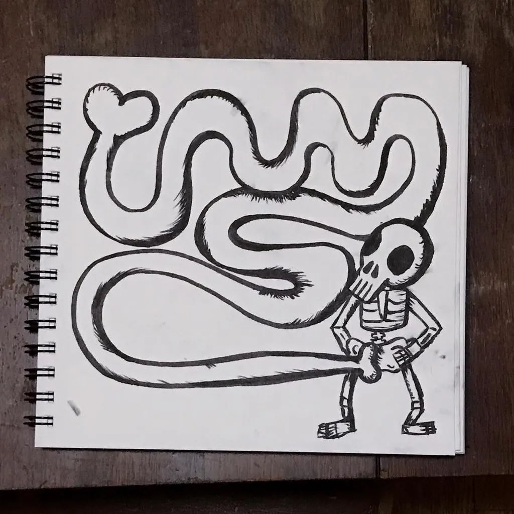 A black and white line drawing on white paper depicts a skeleton figure standing next to a large, winding snake that coils around it.