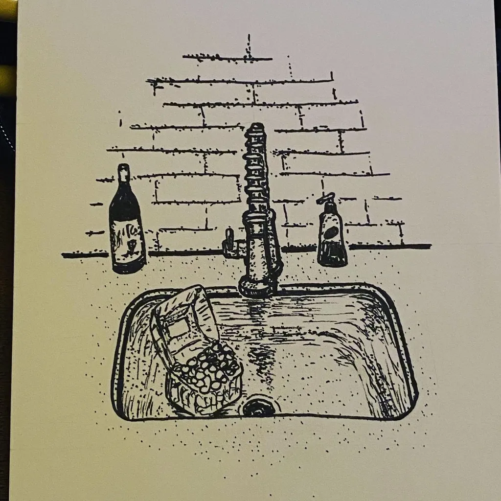 The drawing depicts a sink basin and brick backsplash, rendered in black ink with cross-hatching, showing a central faucet, three bottles, and soap items.