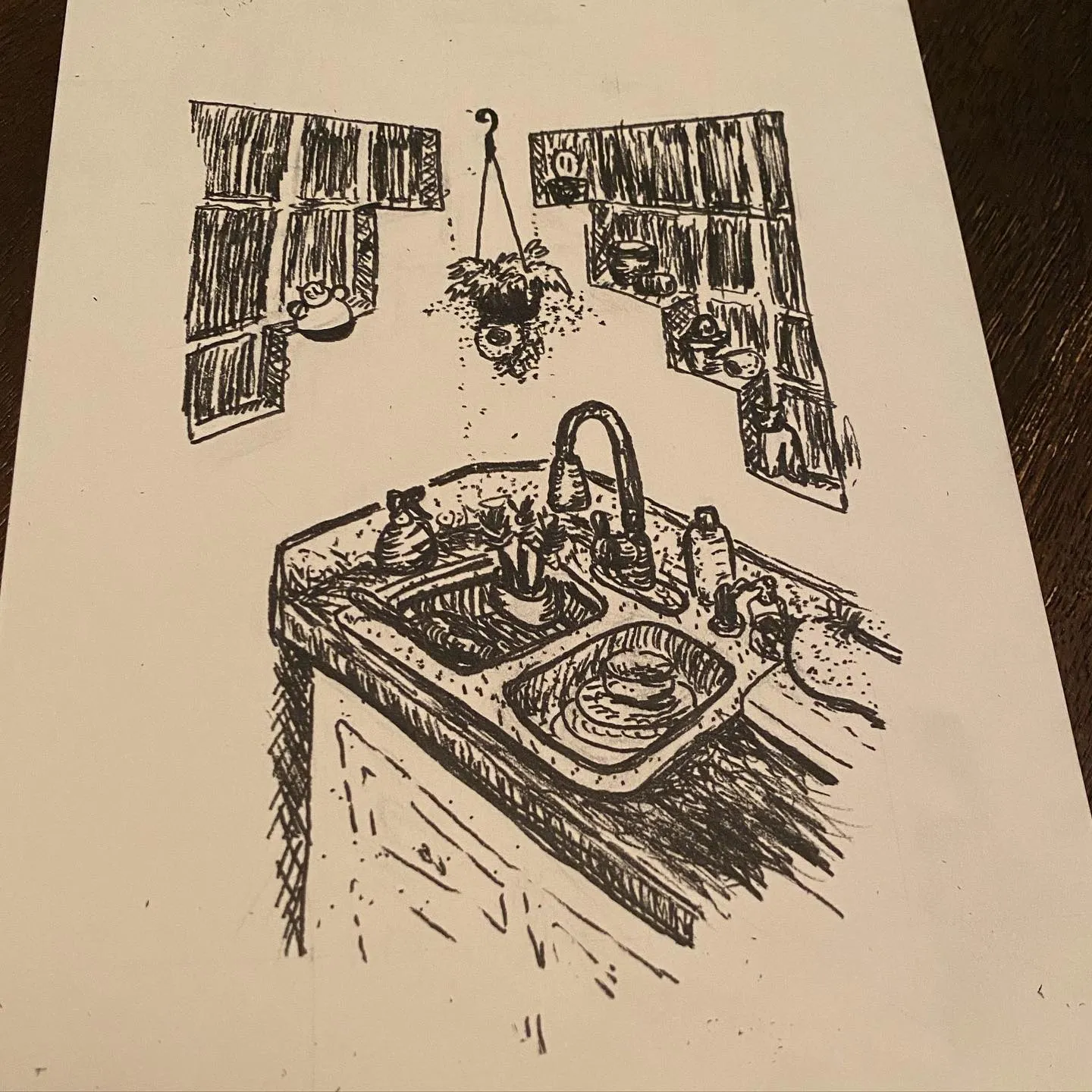 Sketch of a kitchen sink and counter, featuring a faucet, dishes, and small objects, set beneath two rectangular windows in a black and white drawing.