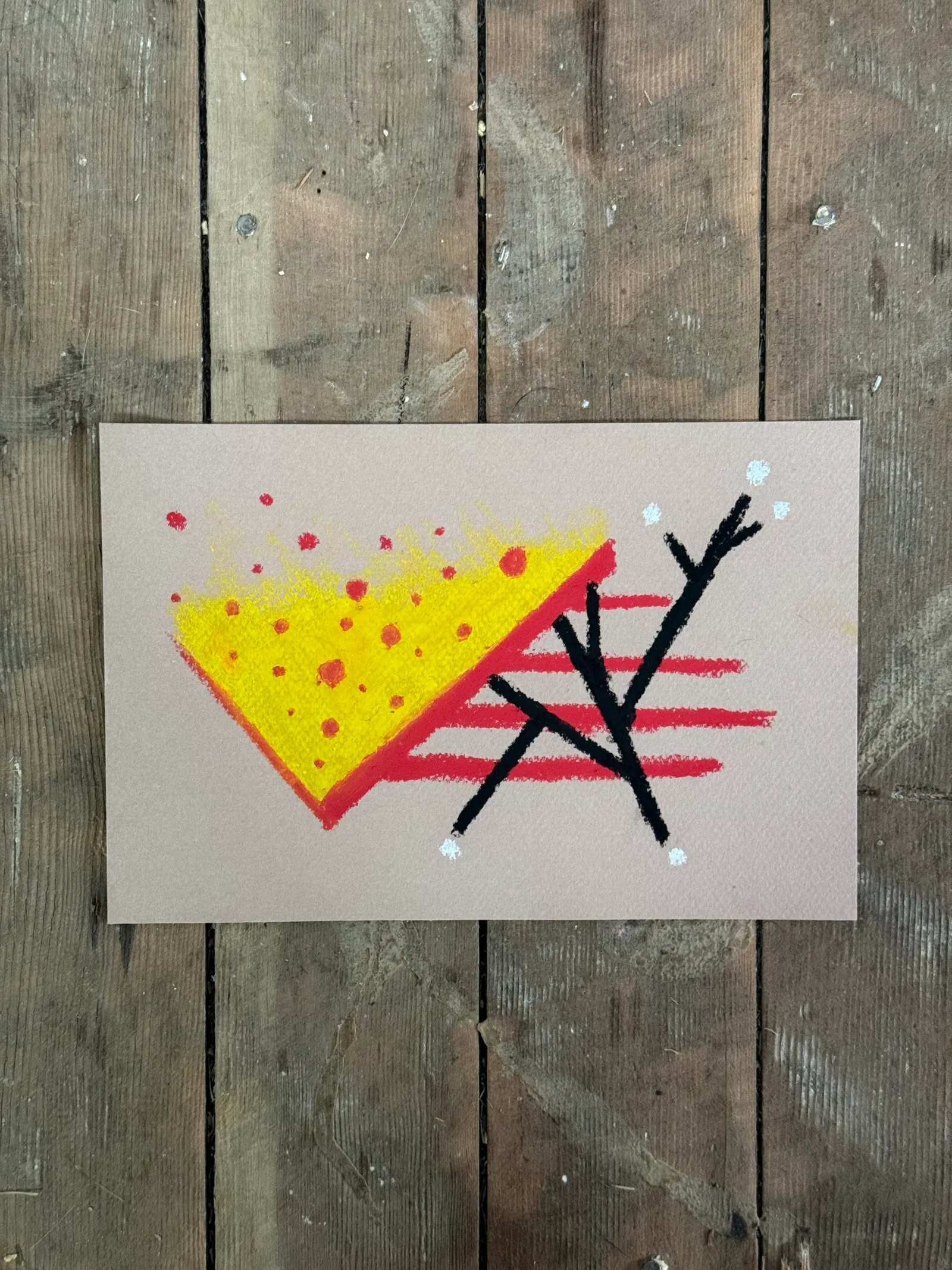 Yellow shape dotted with red sits left of black, branching sticks, anchored by several horizontal red lines on a light background.