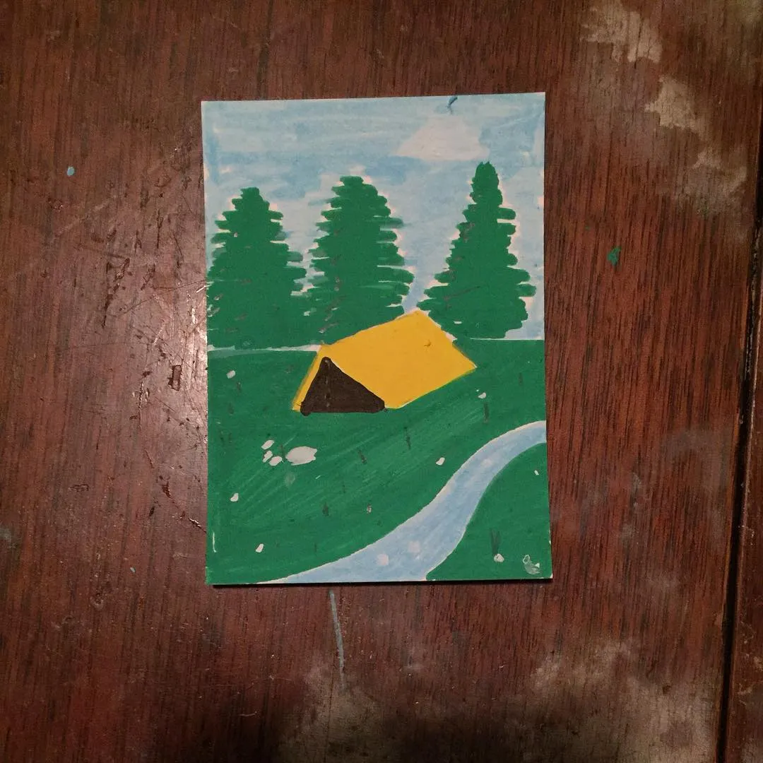 A simple landscape painting featuring a yellow tent in a grassy field, flanked by three dark green trees, with a winding blue path leading through the foreground under a light blue sky.