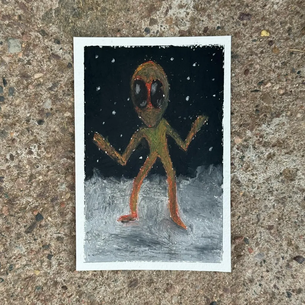 A bipedal alien figure with a dark green body and prominent red eyes stands on a gray patch against a solid black background speckled with white dots.