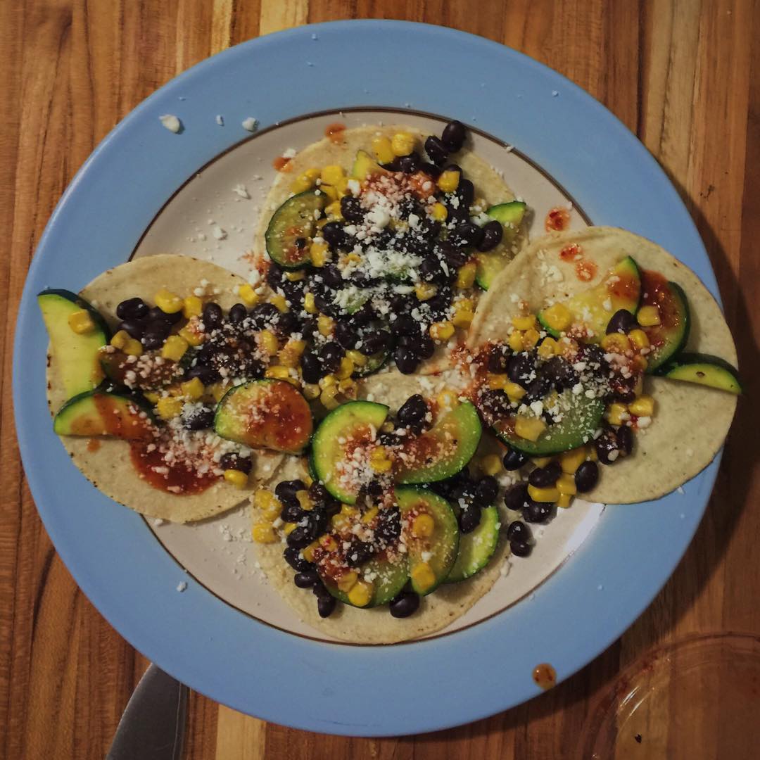 Made some veggie tacos. Zucchini, black beans, corn, salsa, and cotija.