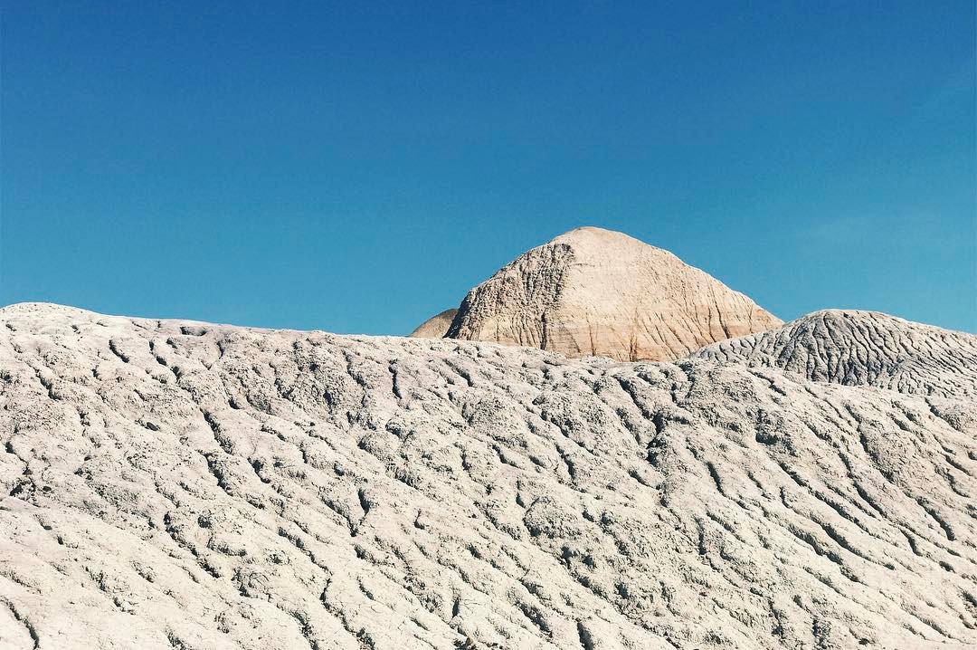 Rising from erosion.