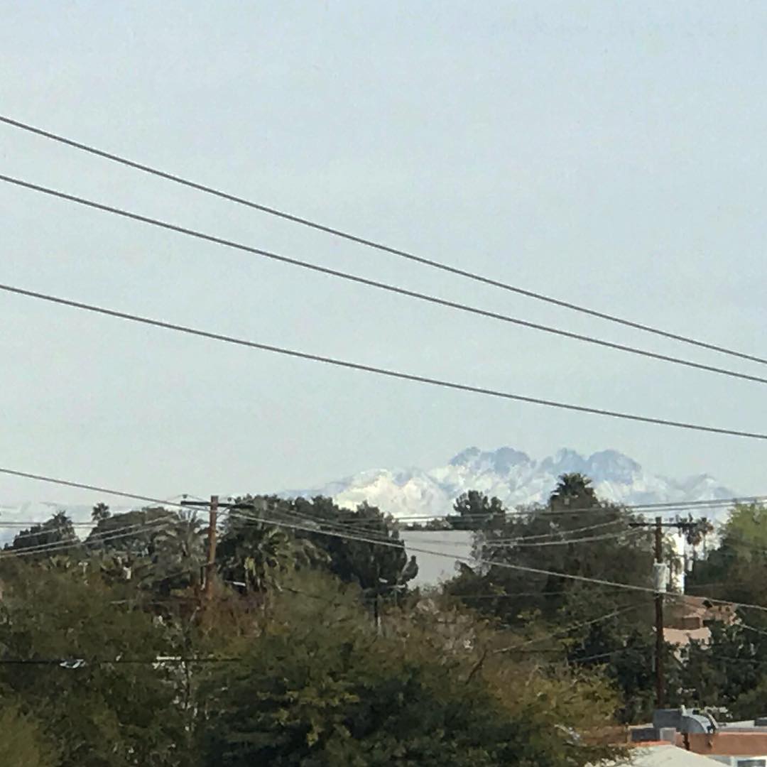 Not a good picture but seeing snow capped mountains from the city is wild.