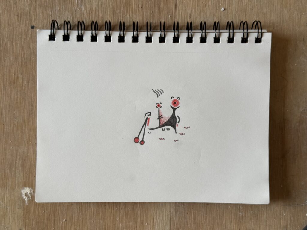 A photo of a red a black abstract pencil sketch. It features red circles, scratches, and squiggles. kind of looks like a face.